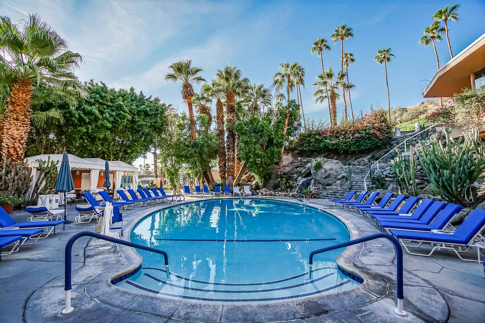A peaceful view of the outdoor swimming pool at VRI's Palm Springs Tennis Club in California.